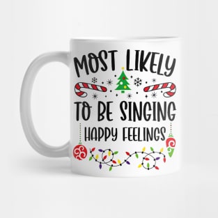 Most Likely To Be Singing Happy Feelings Funny Christmas Mug
